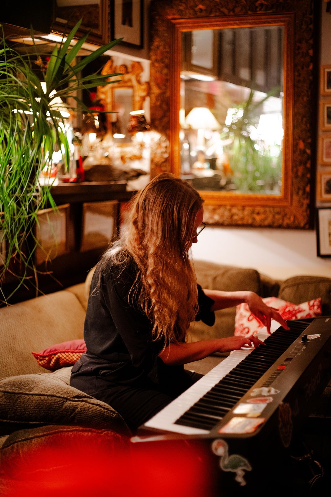 A pianist playing at a private supper club