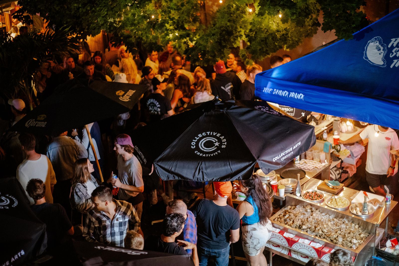A crowd around the oyster tent at Supercrawl