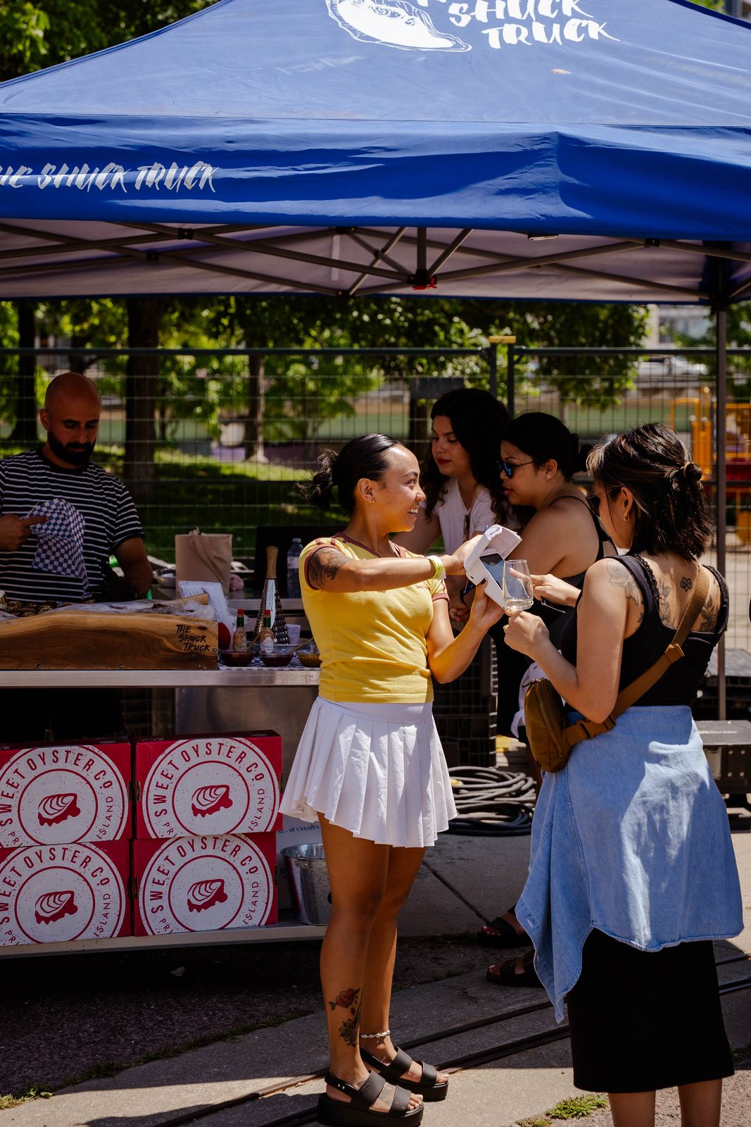 Guests at The Shuck Truck tent at Toronto Food and Wine Fest