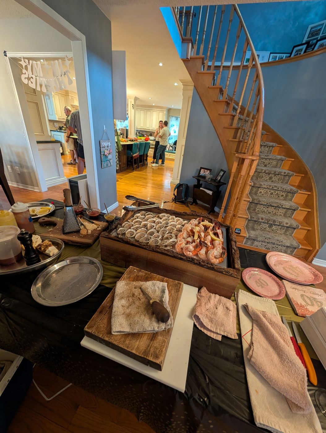 Oysters and shrimp in the live-edge box at a 40th birthday party at home