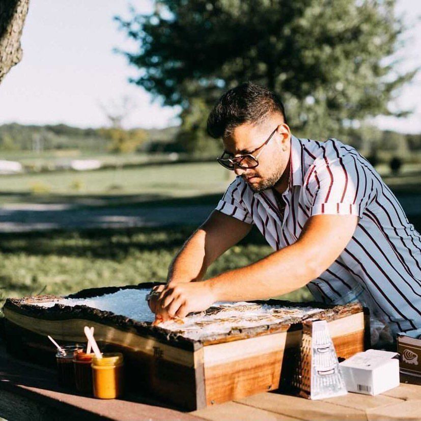 Setting up the live-edge box with ice outdoors in evening sun